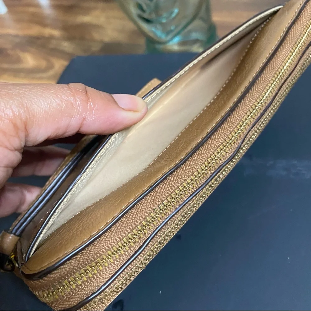 Coach stitched leather